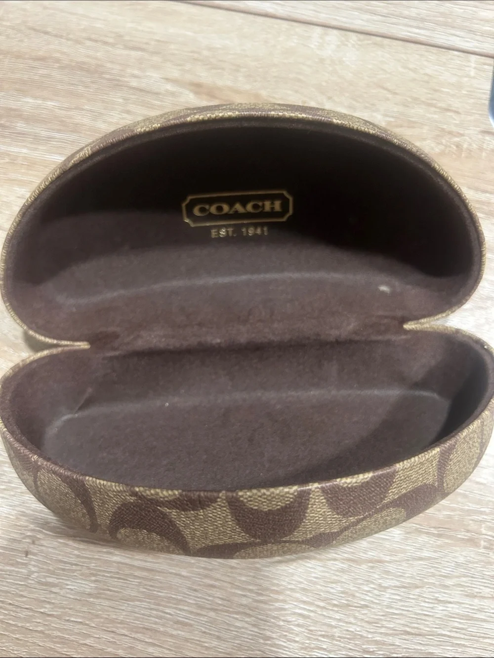 Coach hard shell sunglass case.